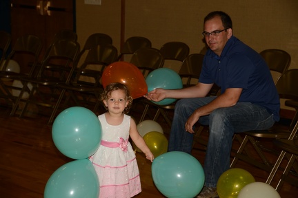 Greta playing with the balloons at Caleb s reception3